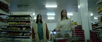 Movie still from “A Banquet” (2021), directed by Ruth Paxton – Medium shot, Low angle