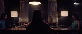 Movie still from “A Banquet” (2021), directed by Ruth Paxton – Medium shot, Low angle