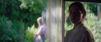 Movie still from “A Banquet” (2021), directed by Ruth Paxton – Close Up shot, Over the shoulder angle