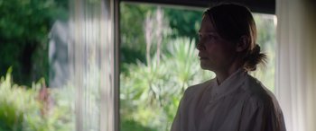 Movie still from “A Banquet” (2021), directed by Ruth Paxton – Close Up shot, Over the shoulder angle