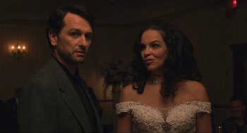 Movie still from “A Beautiful Day in the Neighborhood” (2019), directed by Marielle Heller – A man and a woman standing next to each other in a room; Close Up shot, Over the shoulder angle