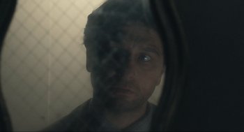 Movie still from “A Beautiful Day in the Neighborhood” (2019), directed by Marielle Heller – A person looking at the camera; Close Up shot, Over the shoulder angle