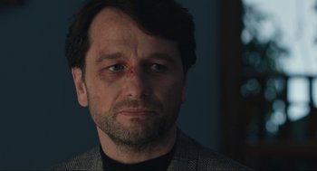 Movie still from “A Beautiful Day in the Neighborhood” (2019), directed by Marielle Heller – A person wearing a jacket; Close Up shot, Over the shoulder angle