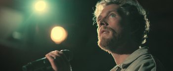 A person holding a microphone