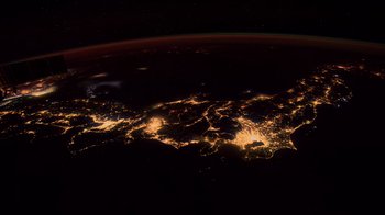 A view of the earth at night taken from space