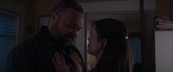 Movie still from “A Christmas Mystery” (2022), directed by Alex Ranarivelo – A man and a woman looking at one another; Close Up shot, Over the shoulder angle