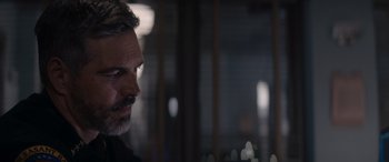 Movie still from “A Christmas Mystery” (2022), directed by Alex Ranarivelo – A person with a beard; Close Up shot, Low angle