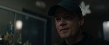 Movie still from “A Christmas Mystery” (2022), directed by Alex Ranarivelo – A person wearing a hat; Close Up shot, Low angle