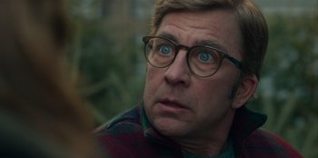 Movie still from “A Christmas Story Christmas” (2022), directed by Clay Kaytis – A person wearing glasses; Close Up shot, Over the shoulder angle