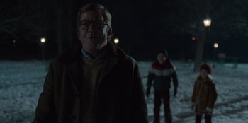 Movie still from “A Christmas Story Christmas” (2022), directed by Clay Kaytis – A man and a woman walking in the snow at night; Medium shot, Over the shoulder angle
