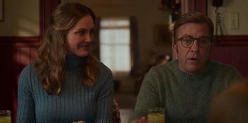 Movie still from “A Christmas Story Christmas” (2022), directed by Clay Kaytis – A man and a woman sitting at a dining table; Close Up shot, Over the shoulder angle