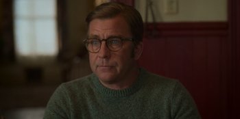 Movie still from “A Christmas Story Christmas” (2022), directed by Clay Kaytis – A person wearing glasses and a sweater; Close Up shot, Over the shoulder angle