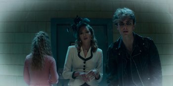 Movie still from “A Christmas Story Christmas” (2022), directed by Clay Kaytis – A group of people standing next to each other in a room; Medium shot, Over the shoulder angle