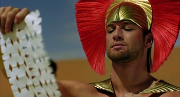 Movie still from “The Fall” (2006), directed by Tarsem Singh – A person wearing a costume; Close Up shot, Low angle