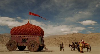 Movie still from “The Fall” (2006), directed by Tarsem Singh – Two men on horses are standing next to a tent; Extreme Wide shot, Low angle