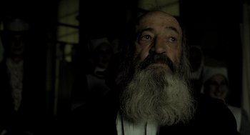 Movie still from “The Fall” (2006), directed by Tarsem Singh – An old man with a long white beard; Close Up shot, Low angle