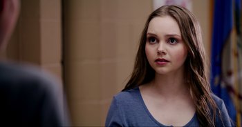 Movie still from “A Cowgirl's Song” (2022), directed by Timothy Armstrong – Close Up shot, Over the shoulder angle