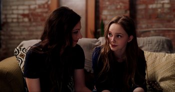 Movie still from “A Cowgirl's Song” (2022), directed by Timothy Armstrong – Close Up shot, Over the shoulder angle