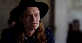 Movie still from “A Cowgirl's Song” (2022), directed by Timothy Armstrong – Close Up shot, Over the shoulder angle