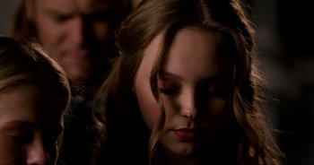 Movie still from “A Cowgirl's Song” (2022), directed by Timothy Armstrong – Close Up shot, Over the shoulder angle