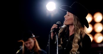 Movie still from “A Cowgirl's Song” (2022), directed by Timothy Armstrong – Medium shot, Low angle