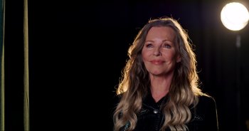 Movie still from “A Cowgirl's Song” (2022), directed by Timothy Armstrong – A woman with long blonde hair wearing a leather jacket; Close Up shot, Low angle