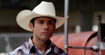 Movie still from “A Cowgirl's Song” (2022), directed by Timothy Armstrong – Close Up shot, Over the shoulder angle