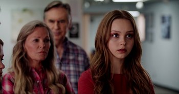 Movie still from “A Cowgirl's Song” (2022), directed by Timothy Armstrong – Close Up shot, Over the shoulder angle