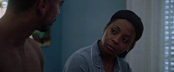 Movie still from “A Fall from Grace” (2020), directed by Tyler Perry – A woman sitting in front of another woman in front of a wall; Close Up shot, Over the shoulder angle