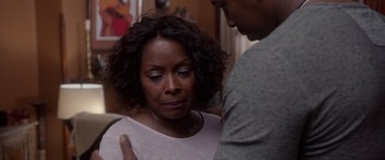 Movie still from “A Fall from Grace” (2020), directed by Tyler Perry – An older woman and a younger man are talking to each other; Close Up shot, Over the shoulder angle