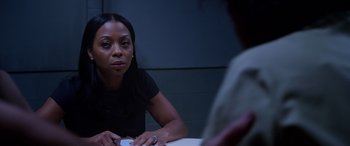 Movie still from “A Fall from Grace” (2020), directed by Tyler Perry – A woman sitting in front of another woman; Close Up shot, Over the shoulder angle