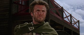 Movie still from “A Fistful of Dollars” (1964), directed by Sergio Leone – A person wearing a scarf; Close Up shot, Low angle