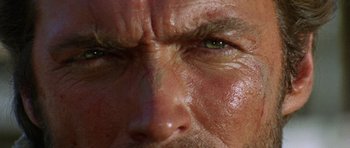 Movie still from “A Fistful of Dollars” (1964), directed by Sergio Leone – A man's face with a lot of wrinkles on his face; Extreme Close Up shot, Low angle