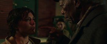 Movie still from “A Good Person” (2023), directed by Zach Braff – A man and a woman talking to each other; Close Up shot, Over the shoulder angle