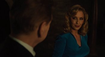 Movie still from “A Haunting in Venice” (2023), directed by Kenneth Branagh – A man and a woman are looking at one another in the dark; Close Up shot, Over the shoulder angle