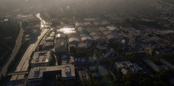 Movie still from “A Hollywood Christmas” (2022), directed by Alex Ranarivelo – An aerial view of a city with lots of buildings; Extreme Wide shot, High angle