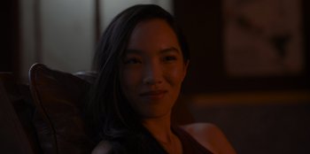 Movie still from “A Hollywood Christmas” (2022), directed by Alex Ranarivelo – A person sitting in a chair; Close Up shot, Over the shoulder angle