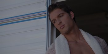 Movie still from “A Hollywood Christmas” (2022), directed by Alex Ranarivelo – A person with a towel; Close Up shot, Over the shoulder angle
