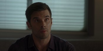 Movie still from “A Hollywood Christmas” (2022), directed by Alex Ranarivelo – A person with his eyes wide open; Close Up shot, Over the shoulder angle