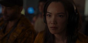 Movie still from “A Hollywood Christmas” (2022), directed by Alex Ranarivelo – A person wearing a headset; Close Up shot, Over the shoulder angle