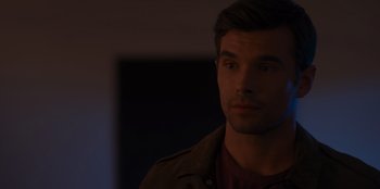 Movie still from “A Hollywood Christmas” (2022), directed by Alex Ranarivelo – A person wearing a jacket; Close Up shot, Over the shoulder angle