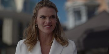 Movie still from “A Hollywood Christmas” (2022), directed by Alex Ranarivelo – A person wearing a suit; Close Up shot, Low angle