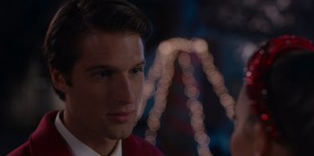 Movie still from “A Hollywood Christmas” (2022), directed by Alex Ranarivelo – A person wearing a red shirt; Close Up shot, Over the shoulder angle
