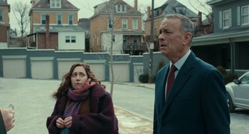 Movie still from “A Man Called Otto” (2022), directed by Marc Forster – A man and a woman standing on the side of a road; Medium shot, Over the shoulder angle
