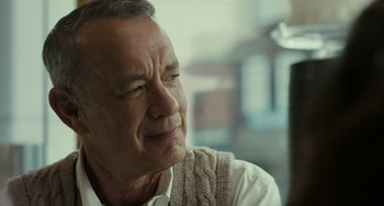 Movie still from “A Man Called Otto” (2022), directed by Marc Forster – An older man is looking out a window; Close Up shot, Over the shoulder angle