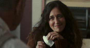 Movie still from “A Man Called Otto” (2022), directed by Marc Forster – A person holding a napkin; Close Up shot, Over the shoulder angle