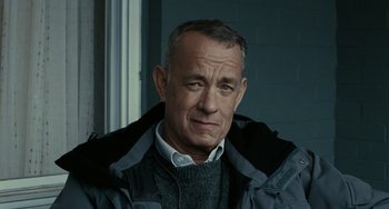 Movie still from “A Man Called Otto” (2022), directed by Marc Forster – A man in a sweater and a jacket looking straight ahead; Close Up shot, Low angle