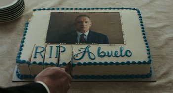 Movie still from “A Man Called Otto” (2022), directed by Marc Forster – A person cutting a birthday cake; Extreme Close Up shot, Overhead angle