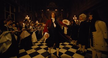 Movie still from “The Favourite” (2018), directed by Yorgos Lanthimos – A group of people dressed in period clothing; Wide shot, Low angle