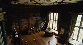 Movie still from “The Favourite” (2018), directed by Yorgos Lanthimos – A room filled with lots of wooden floors and walls; Extreme Wide shot, High angle